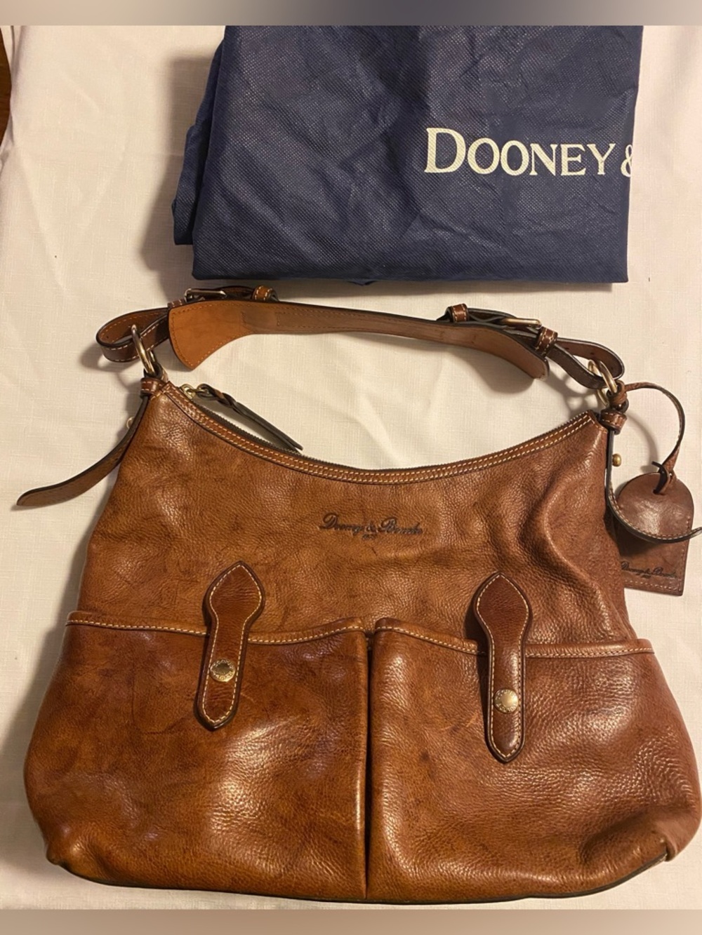 Dooney and Bourke Genuine Florentine Vacchetta Leather shoulder bag